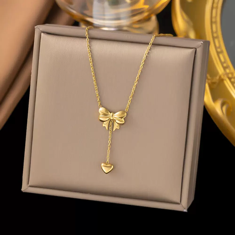 Bow with Heart Pendant